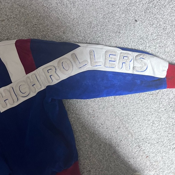 Leather bomber jacket. Never word, small cuff marks. Looks amazing! - Picture 3 of 4